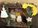 Góralska szopka bożonarodzeniowa wykonana przez Patrycję, Bartka i Kacpra